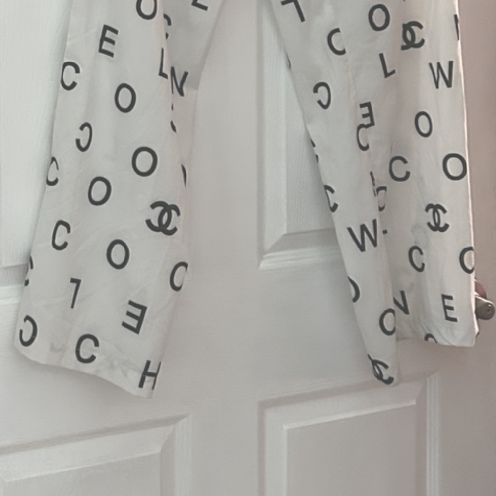 Elegant White Wide Leg Pants with Logo Design